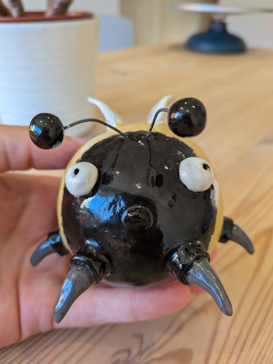 Concerned looking ceramic bee - Linda