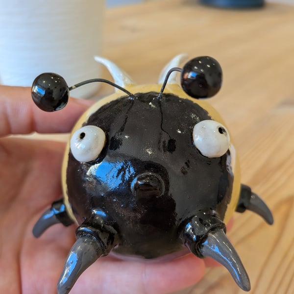 Concerned looking ceramic bee - Linda