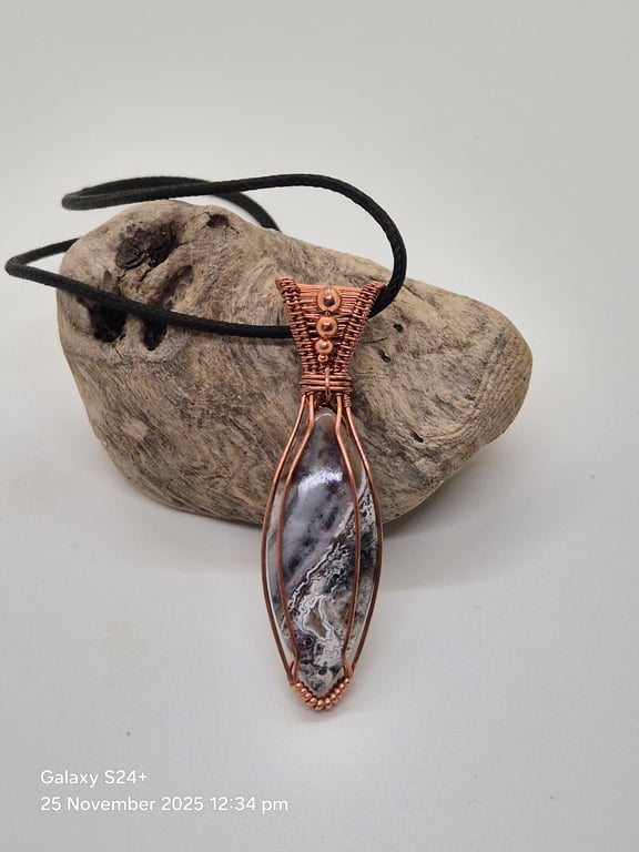 Wire wrapped Crazy Lace agate pendant
