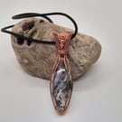 Wire wrapped Crazy Lace agate pendant