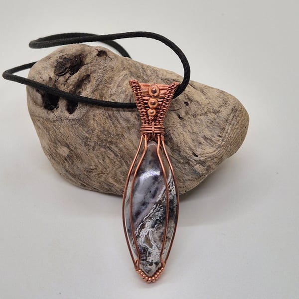 Wire wrapped Crazy Lace agate pendant