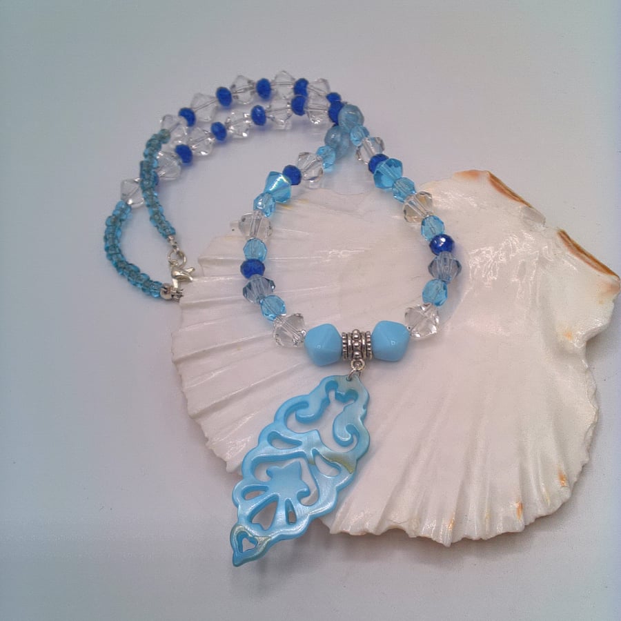 Necklace with Blue and Clear Bicone Beads and a Shell Pendant, Blue Pendant