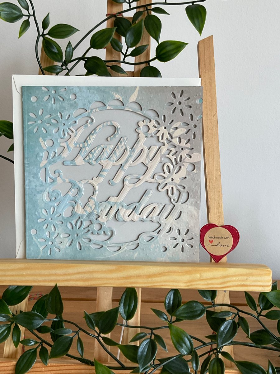 Flower cut blue birthday card