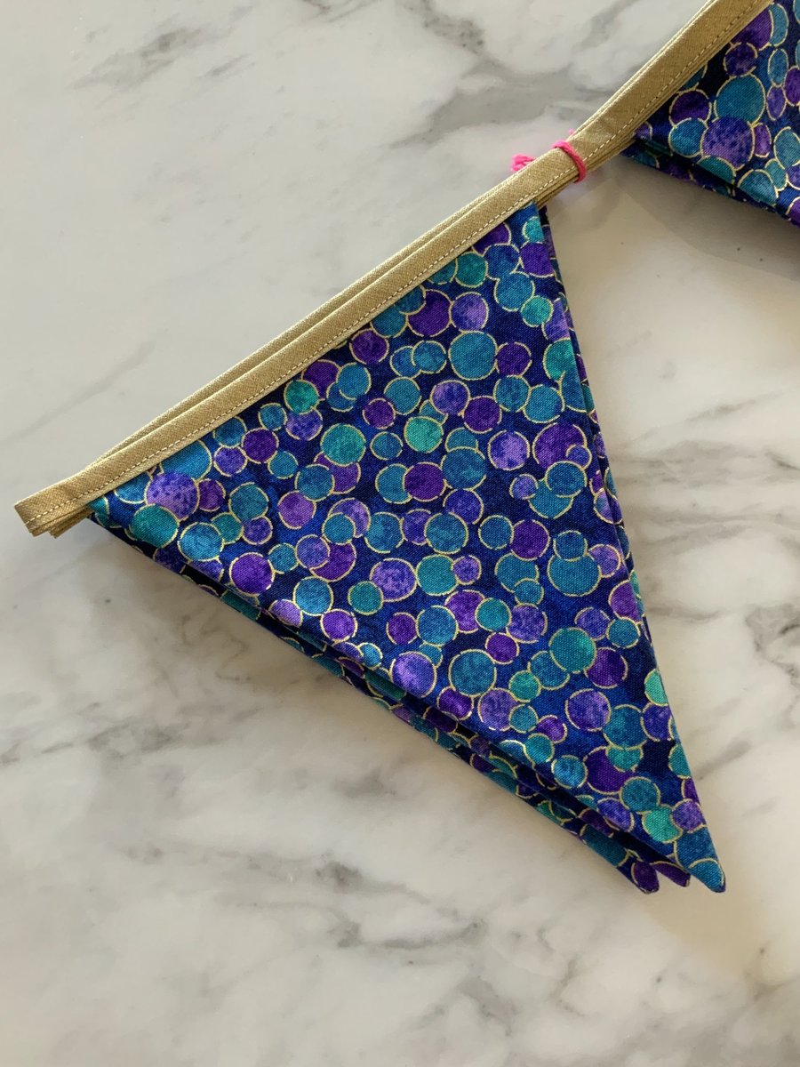 Hanging decoration in Northcott Multidot DeepSea Shimmer Bunting