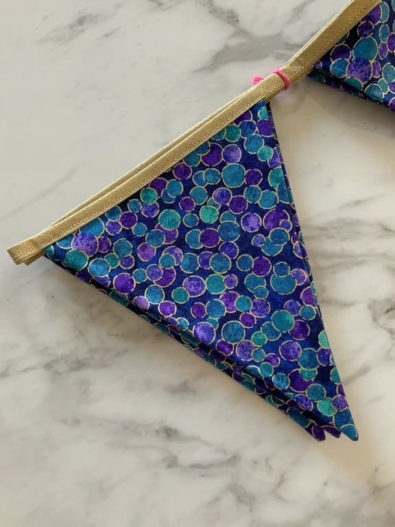 Hanging decoration in Northcott Multidot DeepSea Shimmer Bunting