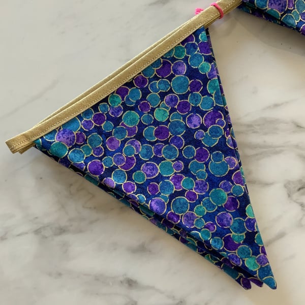 Hanging decoration in Northcott Multidot DeepSea Shimmer Bunting