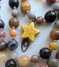 Jasper knotted cord necklace in earthy colours with yellow howlite star - Image 8