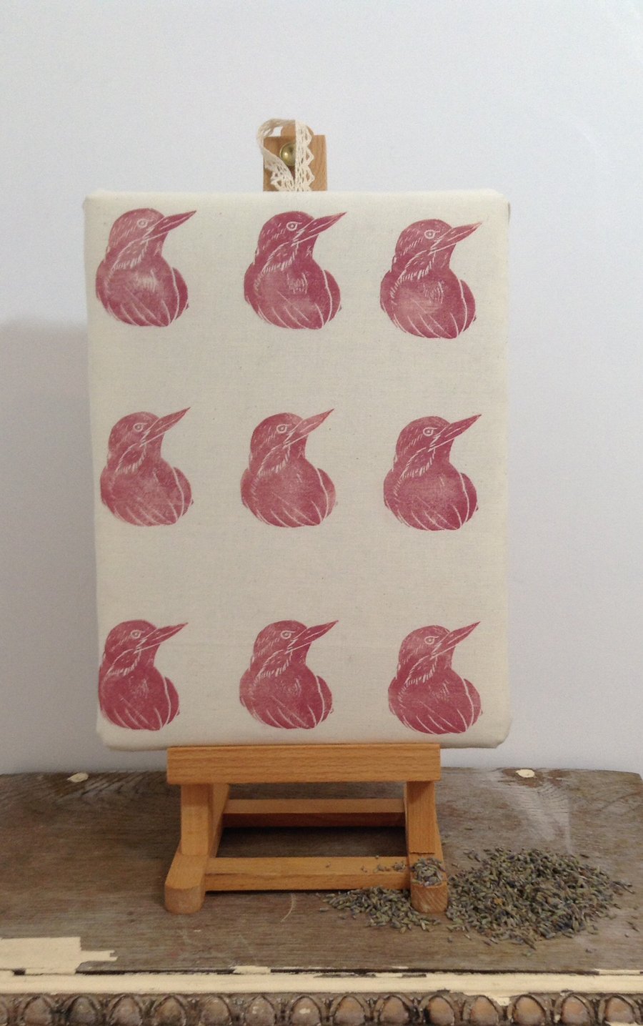 Lino printed bird artwork with lavender blossom