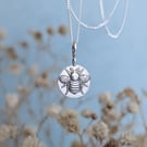 Tiny round Sterling Silver bumblebee charm in gift box, with polishing cloth.