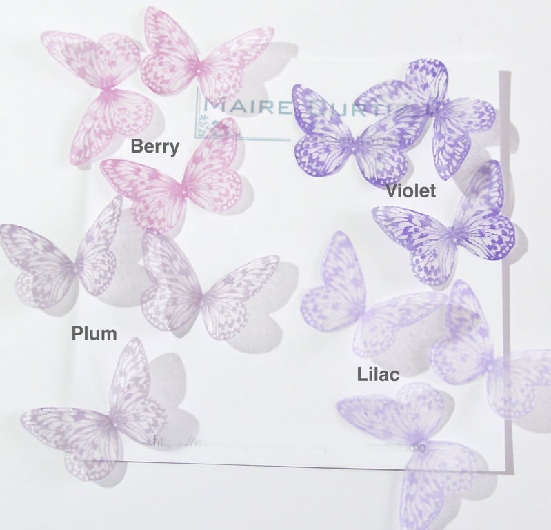 Hand printed silk butterflies in shades of violet.  Two sizes
