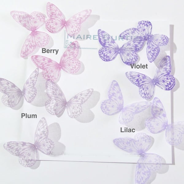 Hand printed silk butterflies in shades of violet.  Two sizes