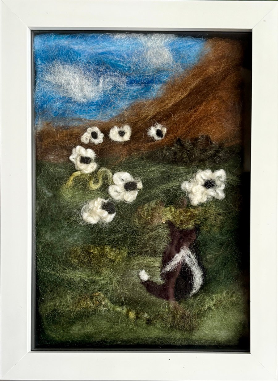 Needle felted scene of a sheep dog guarding the sheep 