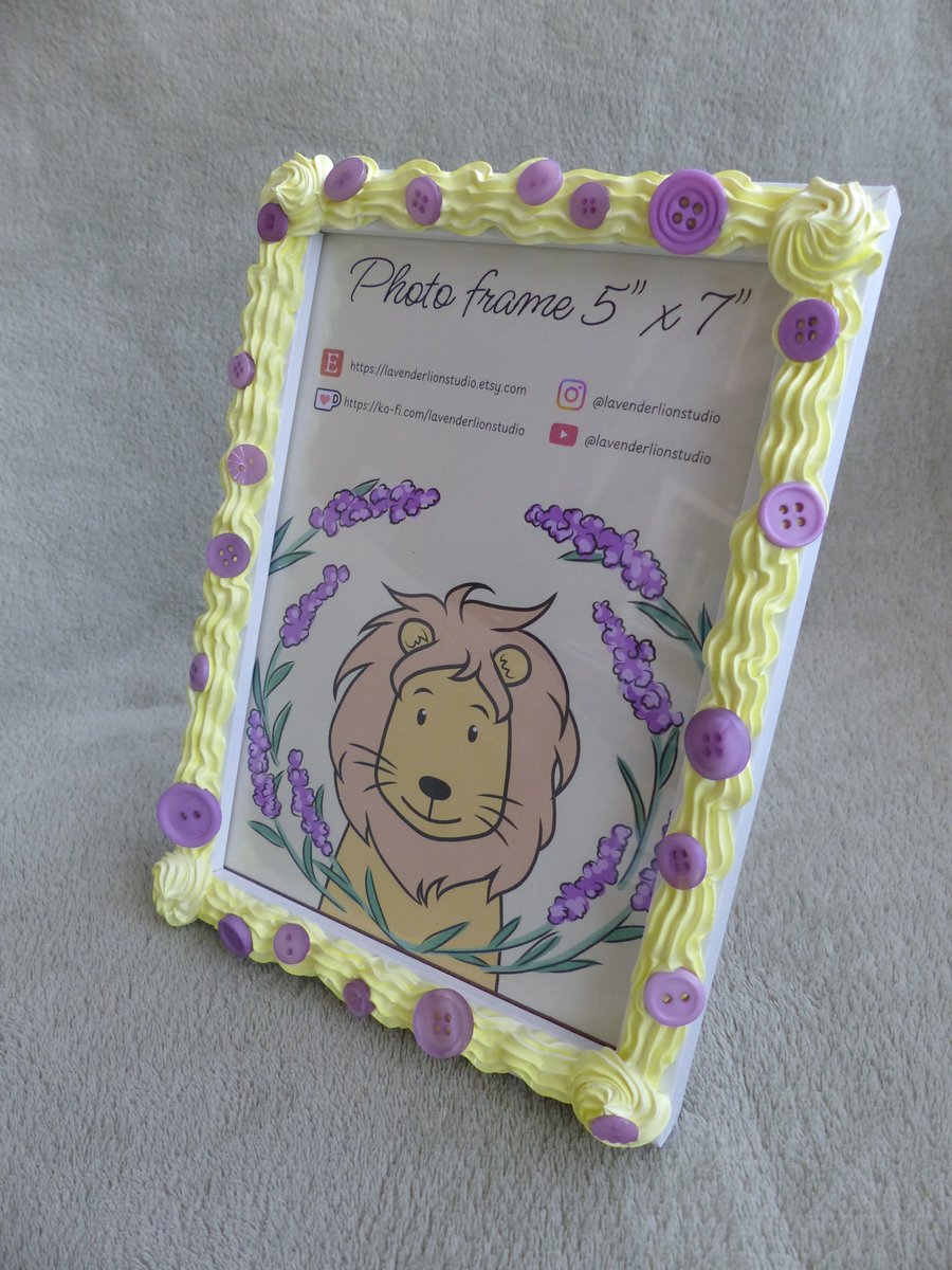 Yellow photo frame with purple buttons