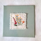 Hand embroidered floral canvas wall hanging, textile art nature wall decor