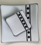 Set of two black and white shallow fused glass dishes