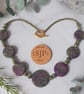 Disc shaped necklace in dark green and magenta - Image 3