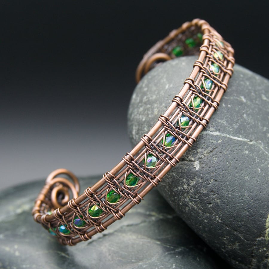 Copper wire armcuff with glass beads, An intricately handwo…