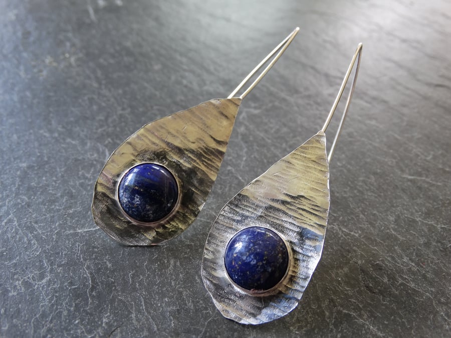 Textured sterling silver tear drop set with stunning lapis lazuli cabochon earri