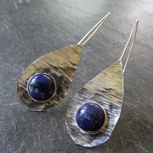 Textured sterling silver tear drop set with stunning lapis lazuli cabochon earri