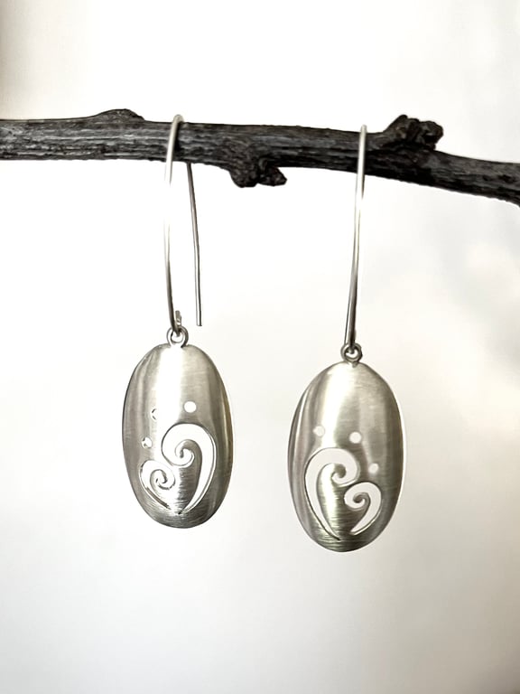 Sterling Silver Domed Oval Swirl Detail Earrings on hook wires