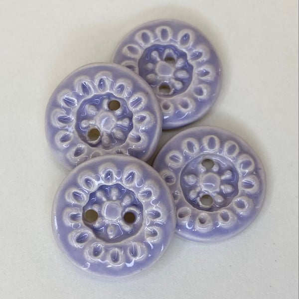 Set of four handmade ceramic buttons lilac