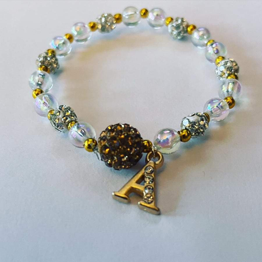 Initial A stretch beaded Goldtone and ab crystal beaded bracelet 