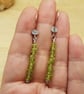 Long Peridot earrings. August birthstone. Bali silver
