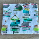 Handmade kindle or ereader cover in fabulous book themed fabric.
