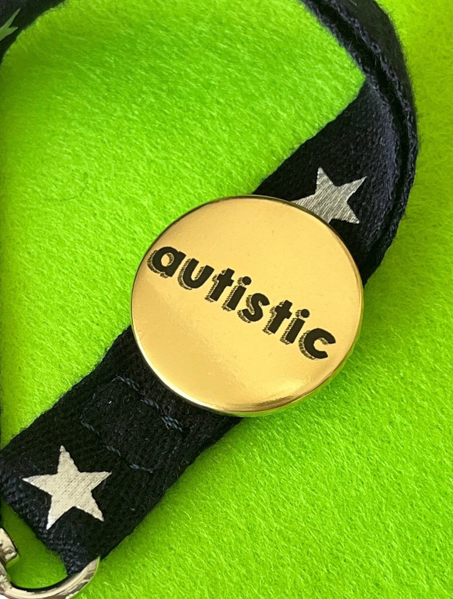 Gold metallic Autistic badge, pocket pebble, magnet or keyring. 