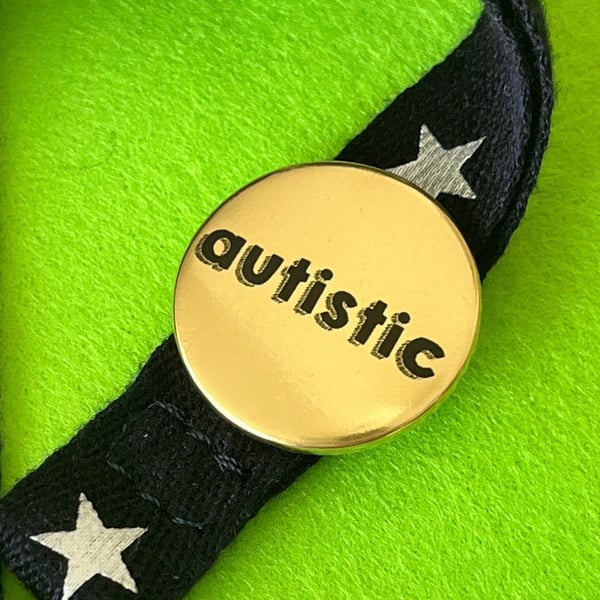 Gold metallic Autistic badge, pocket pebble, magnet or keyring. 