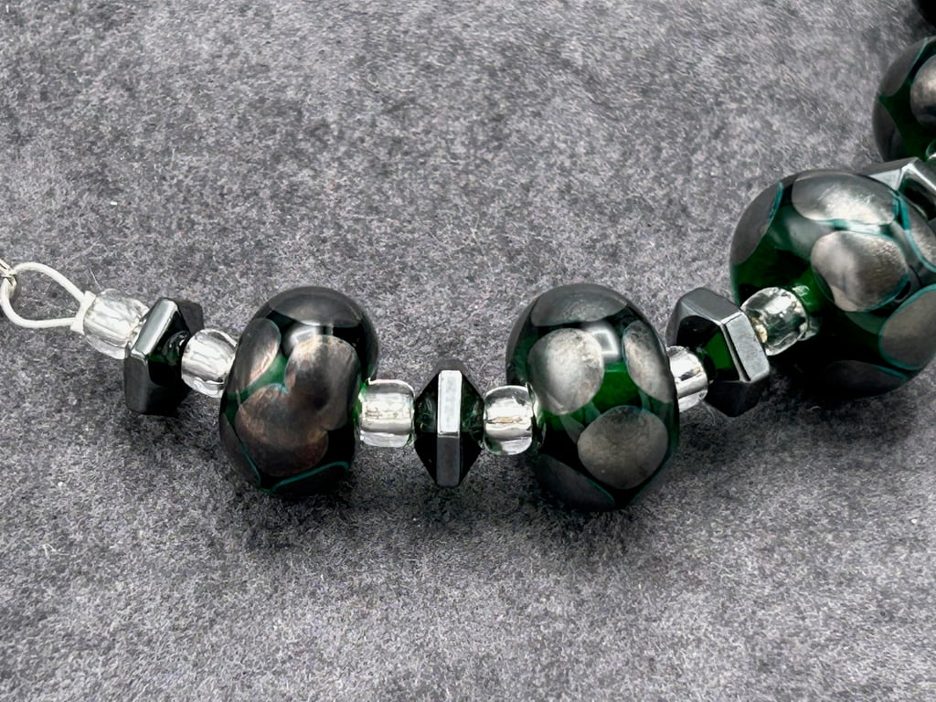 dark green and dark silver spotted lampwork glass necklace