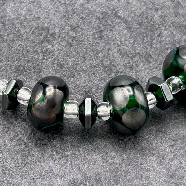 dark green and dark silver spotted lampwork glass necklace