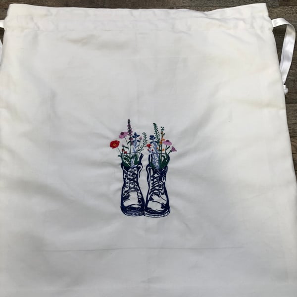 Machine embroidered laundry bag