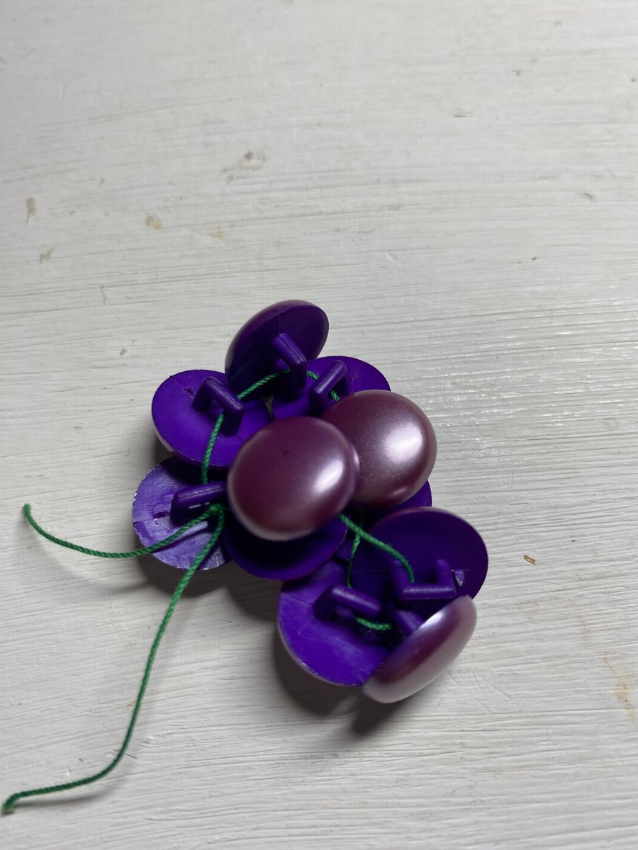 Set of 11 small dusky aubergine buttons with shank 