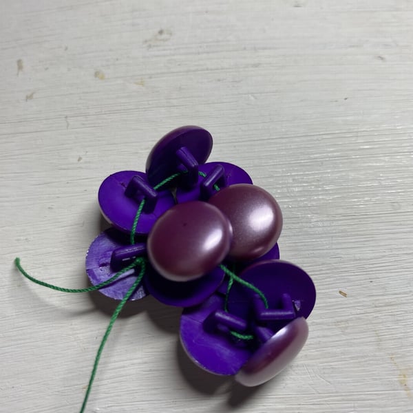 Set of 11 small dusky aubergine buttons with shank 