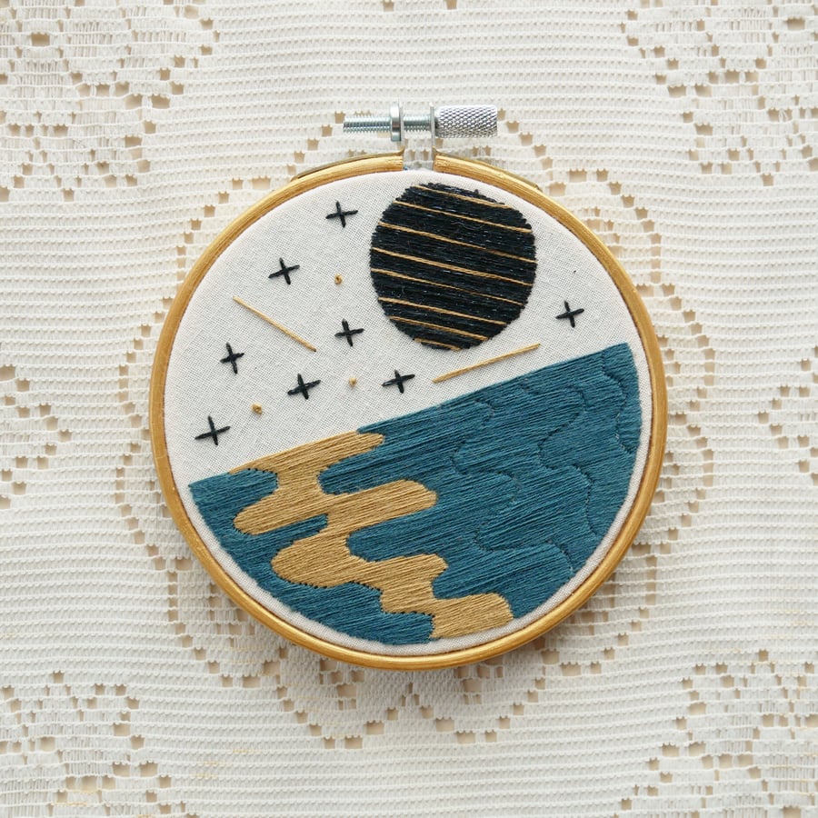 Space and Time 4 inch embroidered piece in Blue, Black and Gold