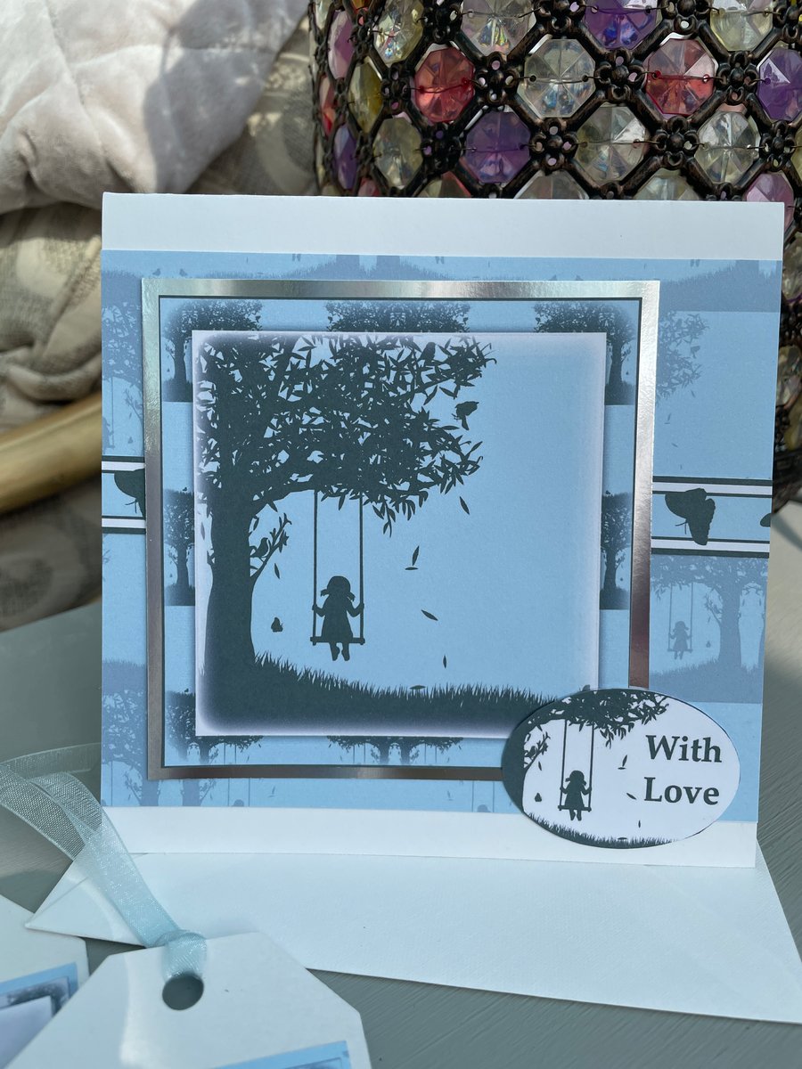 Girl on a swing silhouette With love card. 