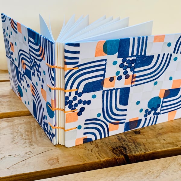 A6 Mixed Media Sketchbook with Unique, Hand-printed Covers and Coptic Binding.