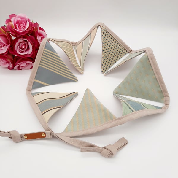 Green mini bunting with taupe backing.  Free uk delivery.  