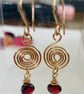 Gold and Garnet contemporary swirl earrings  - Image 3