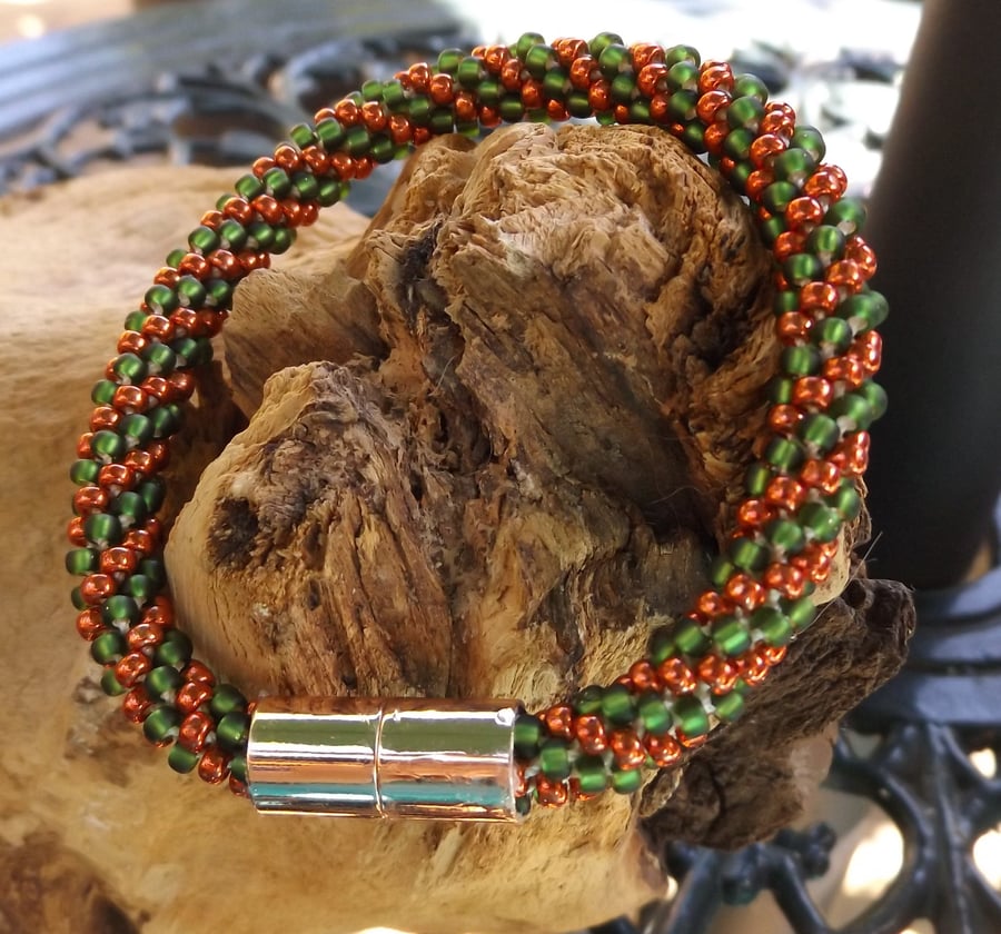 Kumihimo bracelet with Green and bronze seed beads