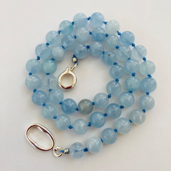 Aquamarine 8mm beads hand knotted and strung on silk 