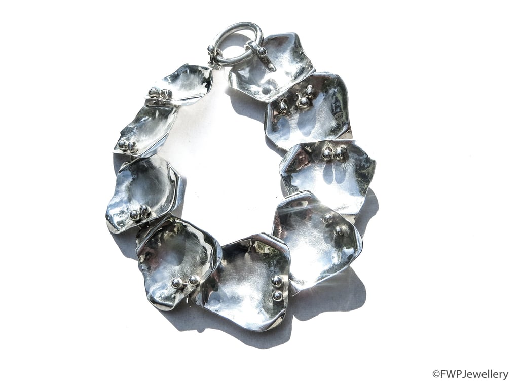 Silver Bracelet with Linked Hinged Shells
