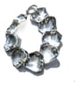 Silver Bracelet with Linked Hinged Shells - Image 1
