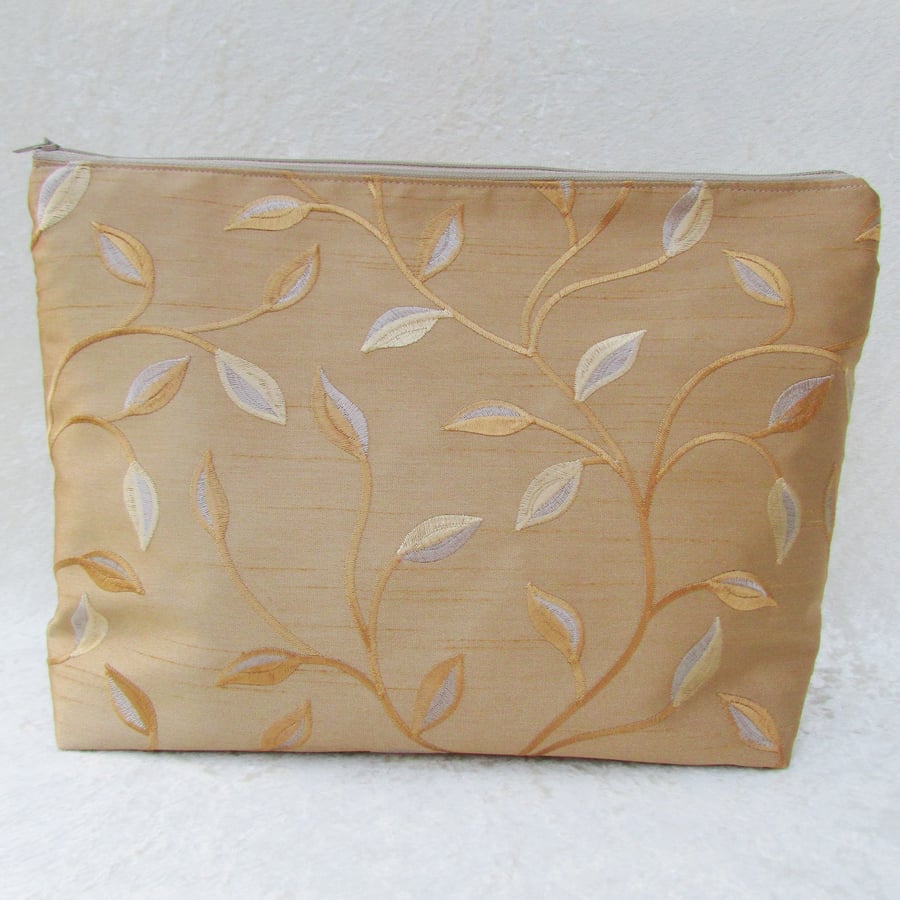 Gold leaf pattern toiletry bag