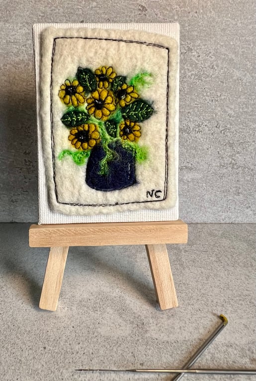 Mini sunflowers in vase