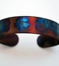 Steel flowers Cuff with multicolured finish, slim size surgical steel bracelet - Image 1