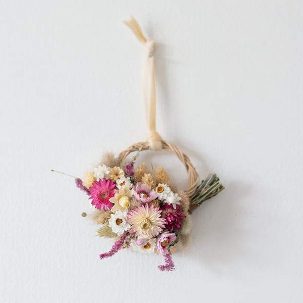 Mini handmade pink and white dried flower wreath hanging