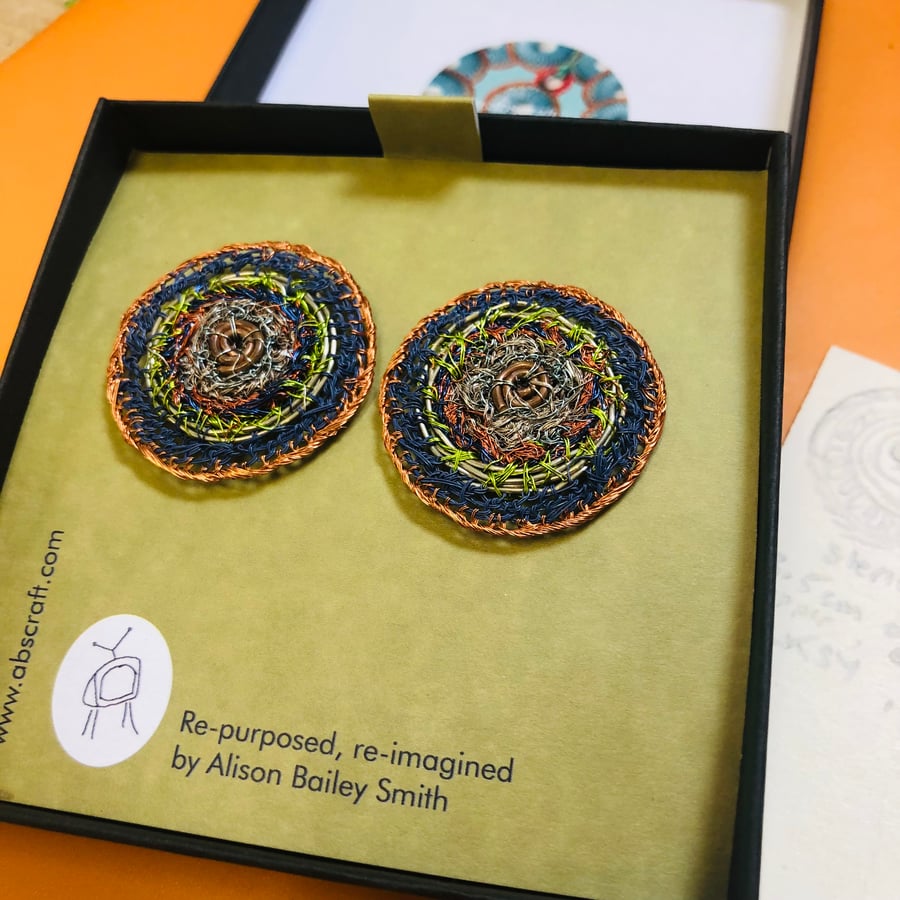 Large round sterling silver studs of recycled materials