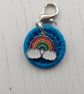 Turquoise Dorset Button with a Rainbow Charm for a Bag Jacket Zip Journal - Image 1